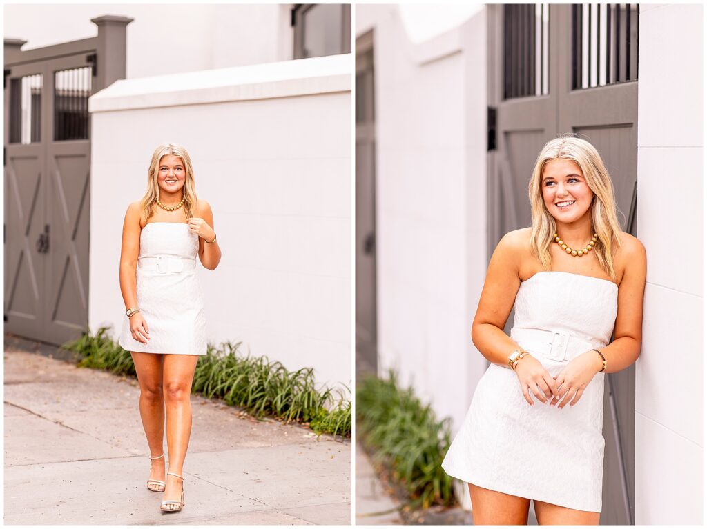Charleston senior photography session featuring a senior in a white dress walking along Meeting Street at sunrise.