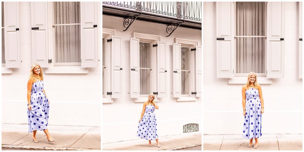 Joyful senior portraits in Charleston featuring a high school senior in a blue polka-dot dress surrounded by historic architecture on Tradd Street.