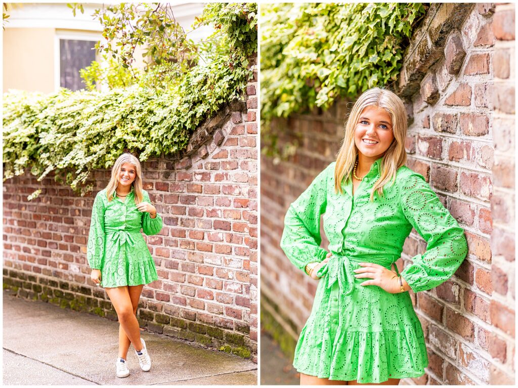 Chic senior portraits in Charleston SC featuring a senior girl in a green dress surrounded by historic homes and warm light.
