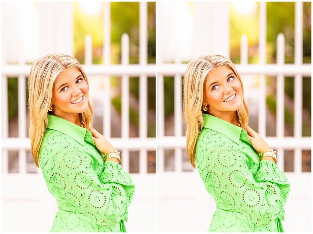 Chic senior portraits in Charleston SC featuring a senior girl in a green dress surrounded by colorful homes and warm light.