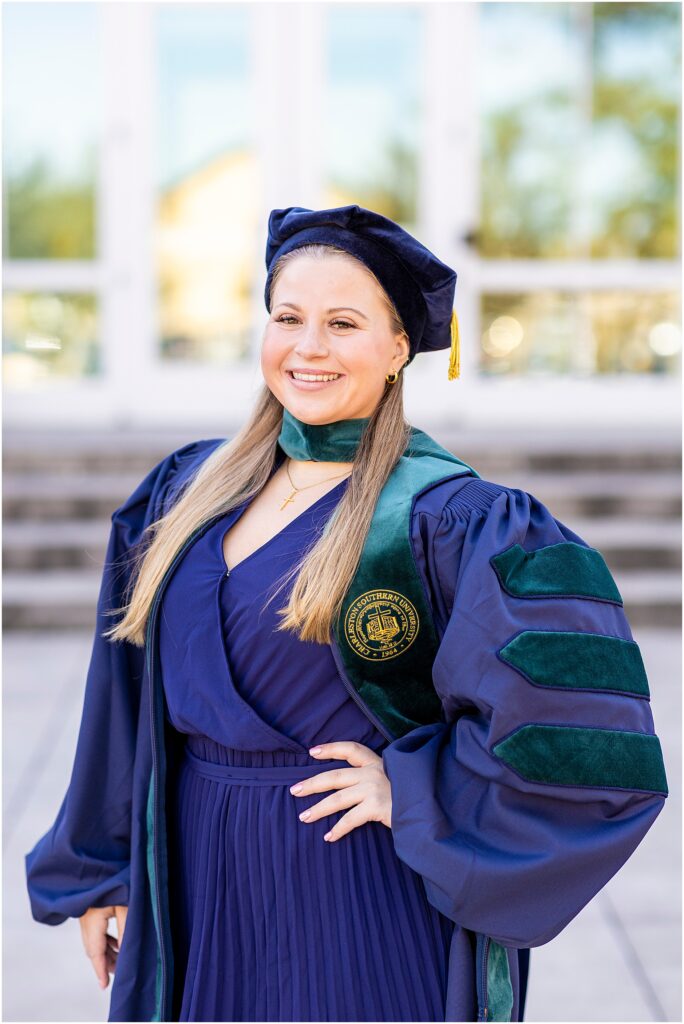 Charleston Southern University DPT graduate celebrating her graduation in Charleston