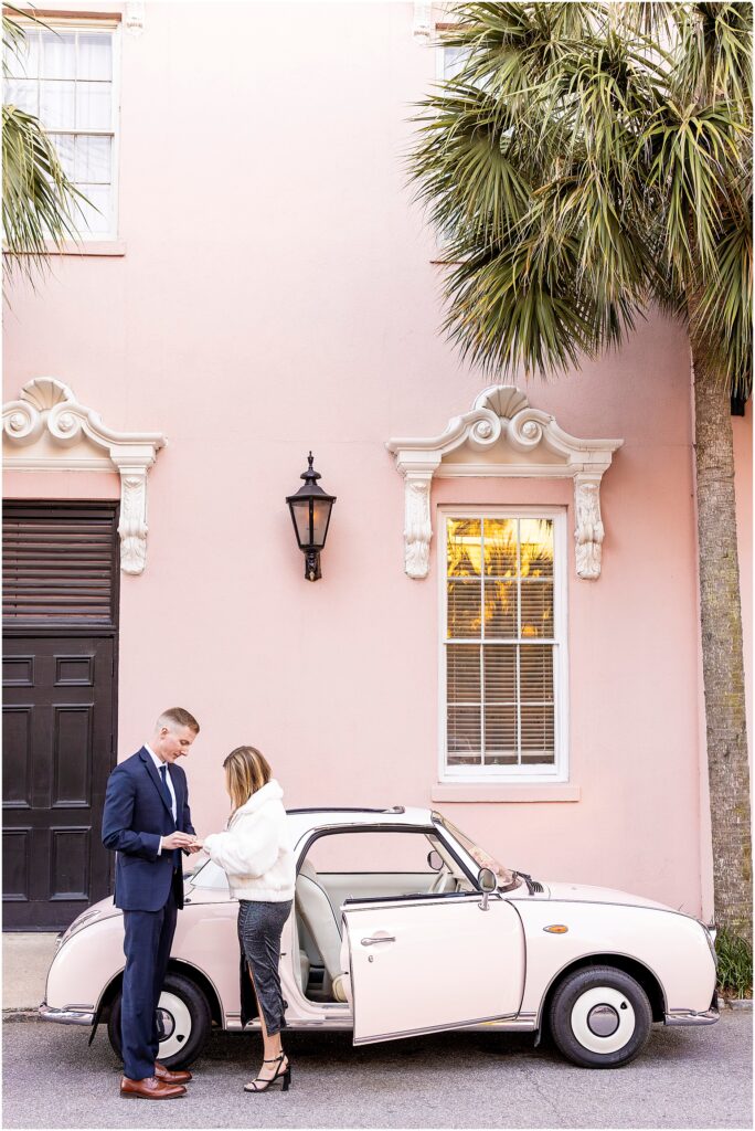 Matt and Taylor embrace moments after getting engaged at The Pink Figgy.