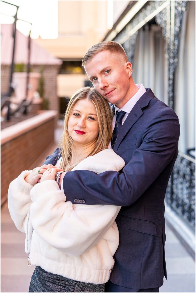 Newly engaged couple posing at The Mills House.