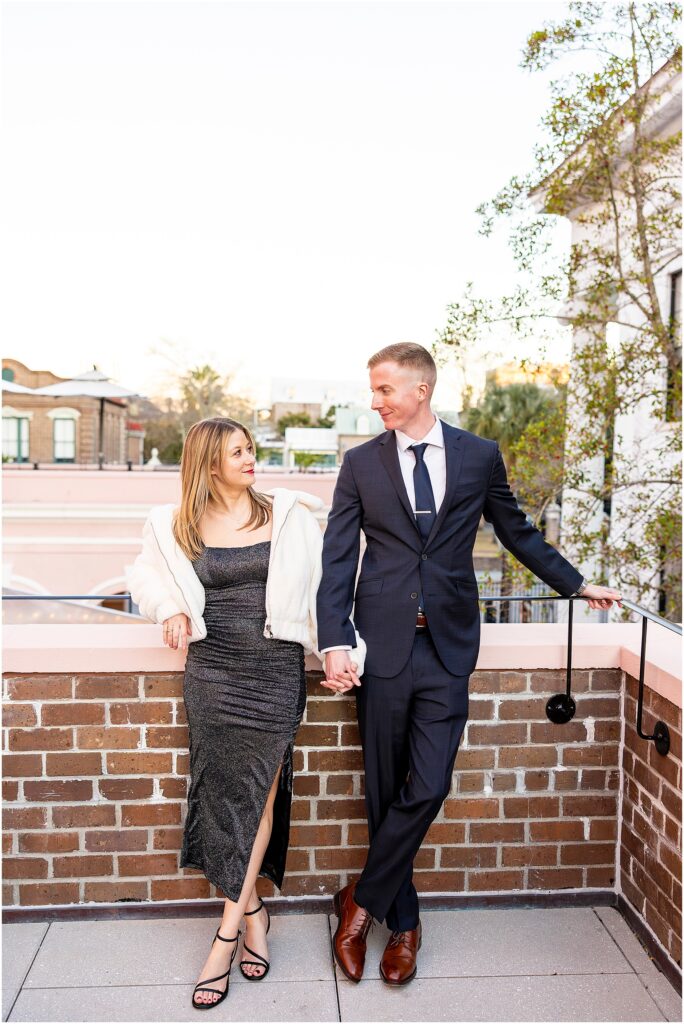 Matt and Taylor sharing a celebratory moment during their New Year’s Eve engagement.