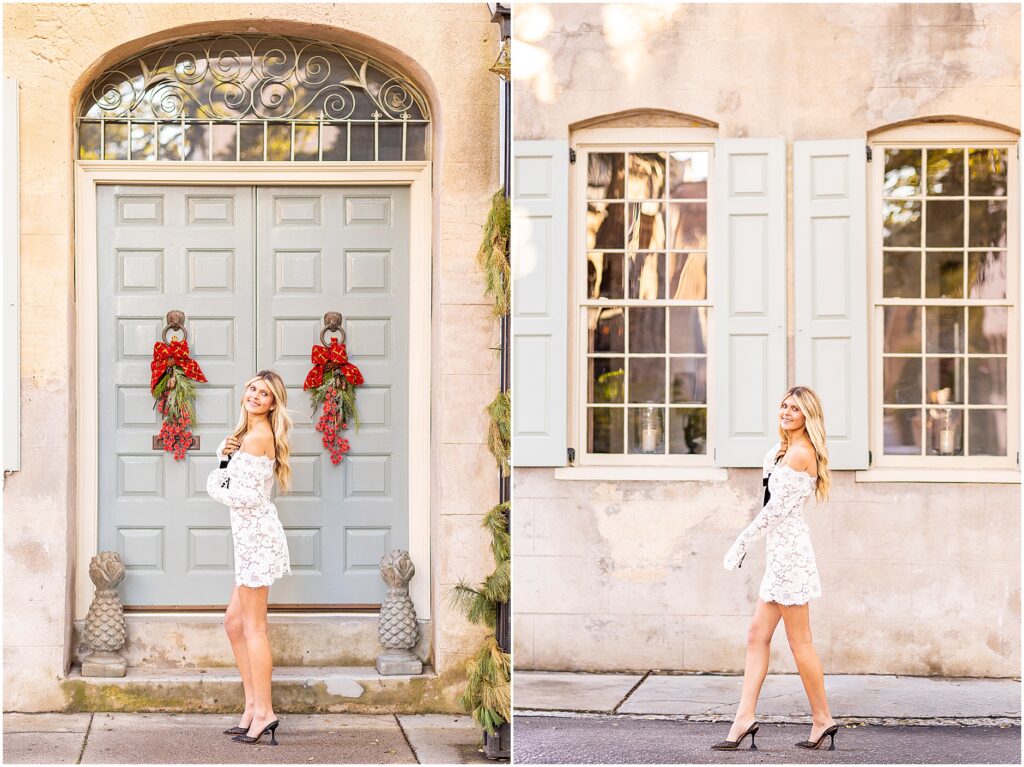 Bella smiling while sitting on a low wall near Tradd Street, surrounded by Charleston flowers for her senior portraits.