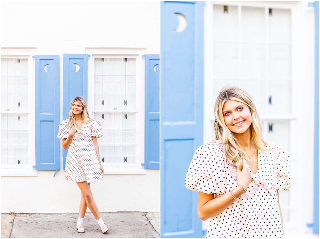 Bella walking along a brick sidewalk near Rainbow Row with Charleston homes in the background.