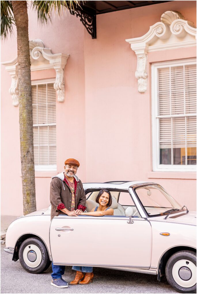 Couple smiling and laughing during a Valentine’s Day session at The Mills House Charleston.