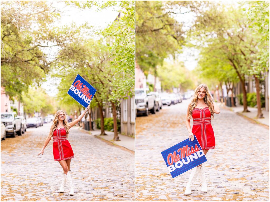 Charleston senior photos on cobblestone Chalmers Street with college commitment sign