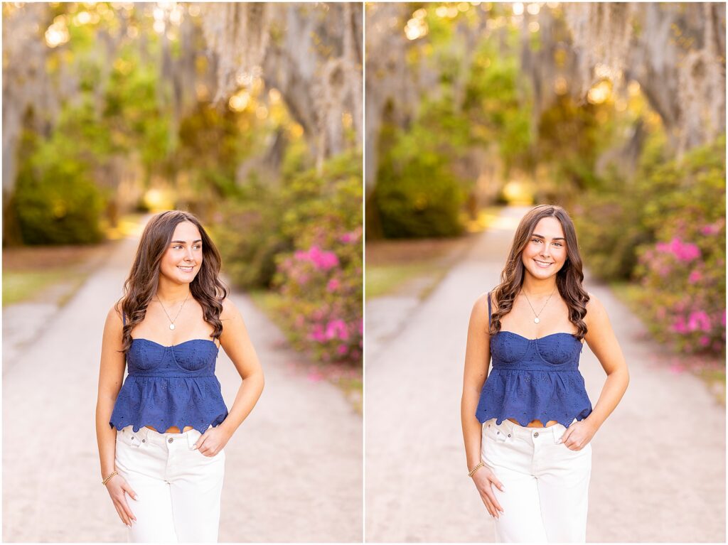 Wind sweeping a high school senior girl's hair as she poses under the Spanish moss for her senior photos in Hampton Park