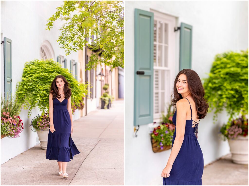 High school senior posing in front of colorful houses on Rainbow Row Charleston SC