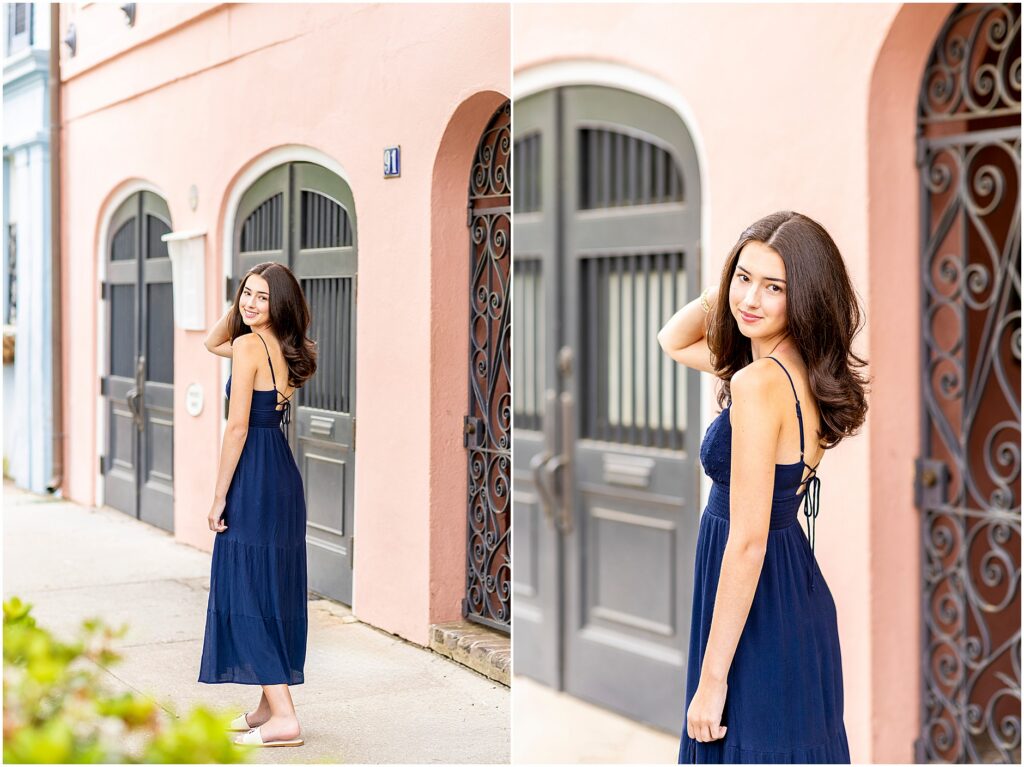 Downtown Charleston South Carolina senior portraits with pastel buildings and evening light
