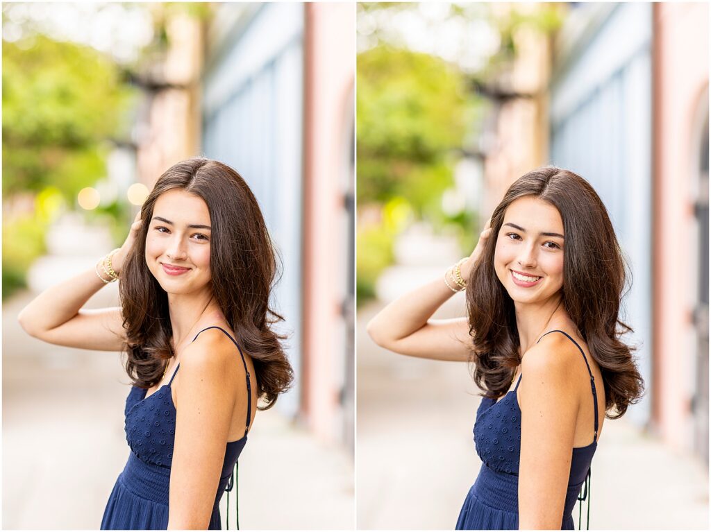Charleston senior photos at Rainbow Row with pastel historic homes blurred in the background