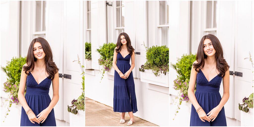 Downtown Charleston senior portraits with pastel homes and evening light
