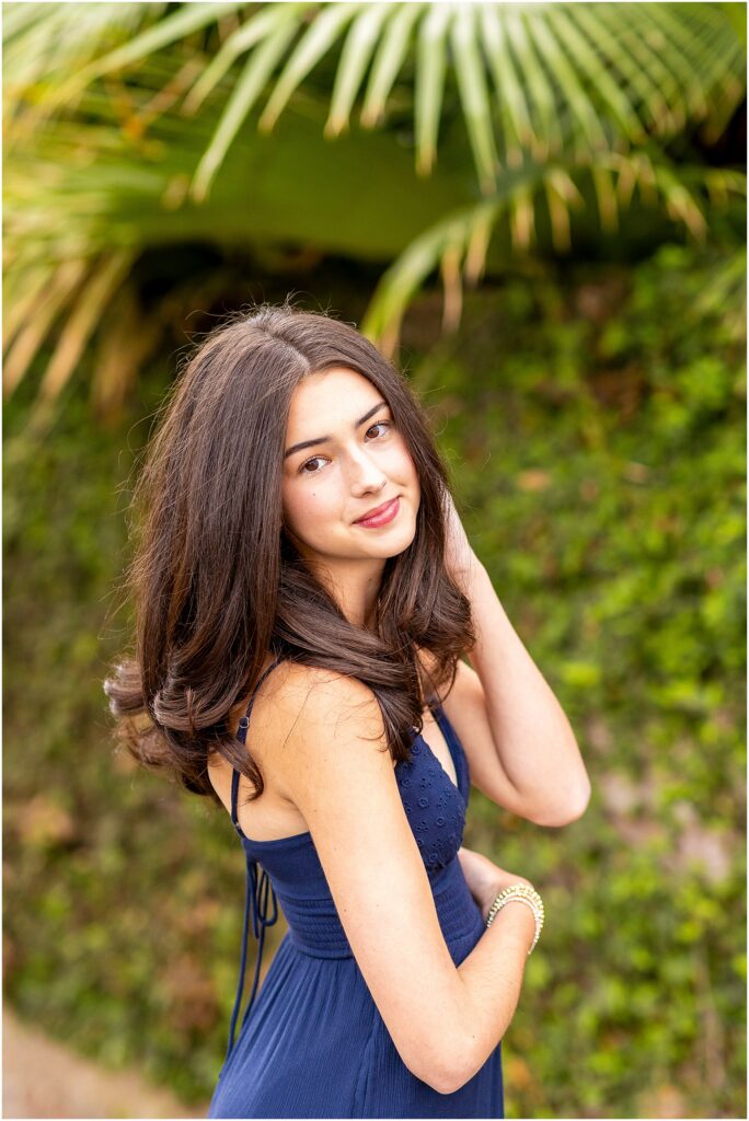 Time less senior photo in Downtown Charleston with evening light and greenery