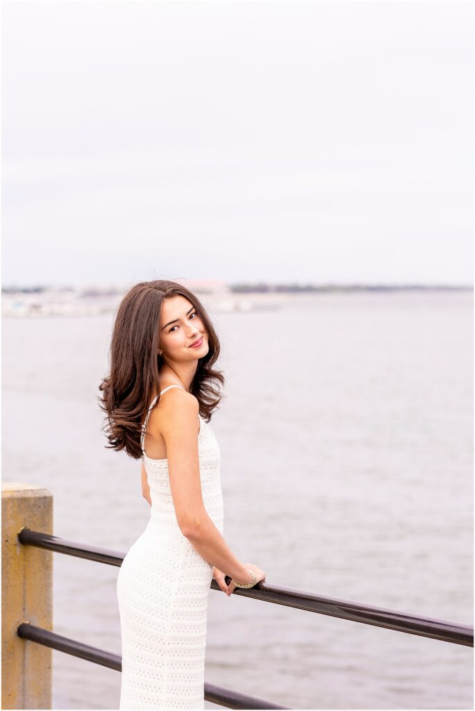 Charleston senior portraits with coastal scenery and palm trees at The Battery