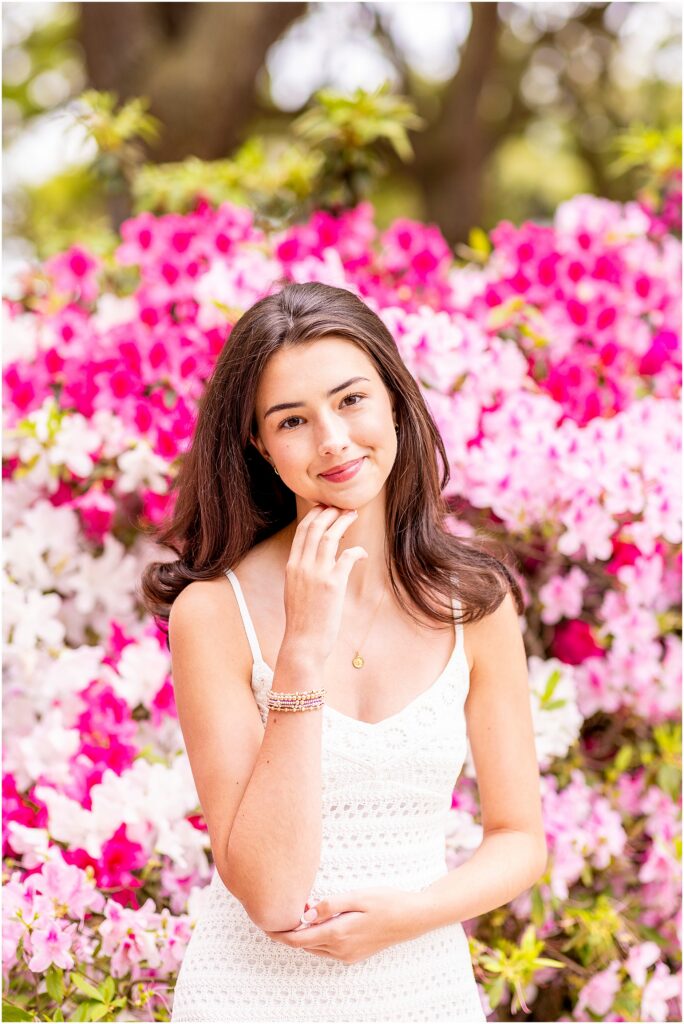 Senior photos in White Point Garden Charleston with blooming azaleas