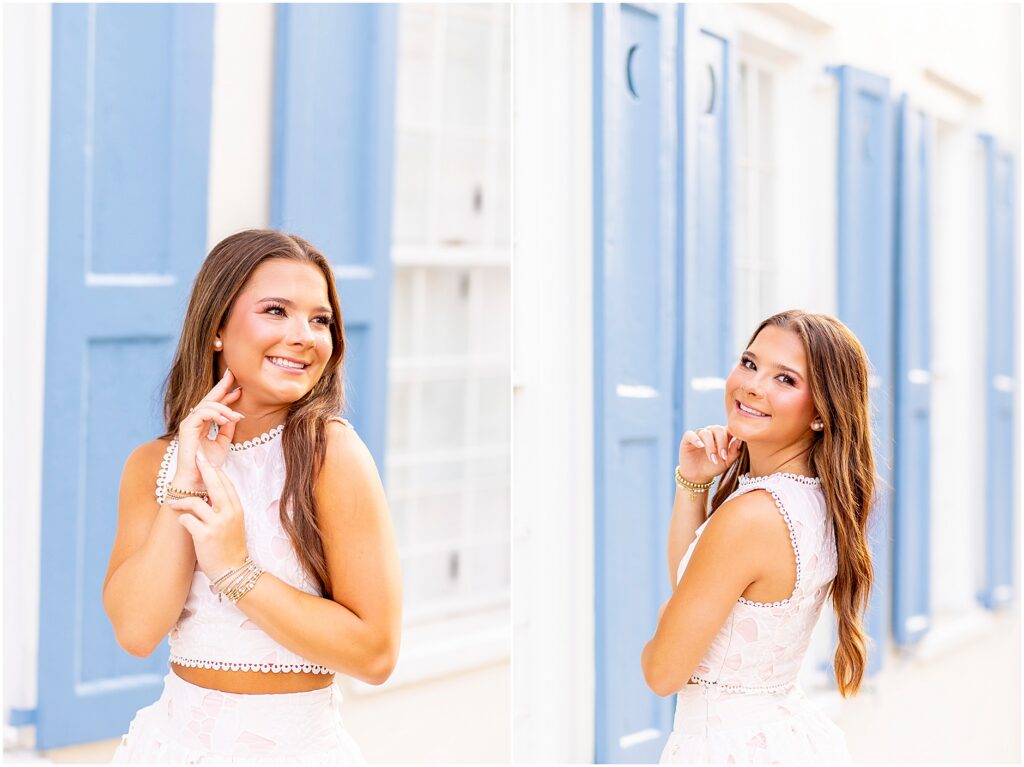 Senior portraits on Tradd Street in Charleston with iconic blue and white house as the backdrop