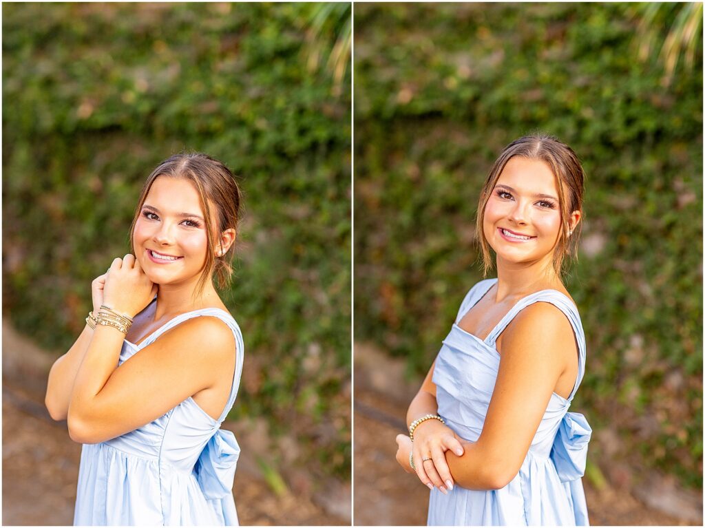 Soft and elegant senior portraits in downtown Charleston South Carolina with greenery behind her