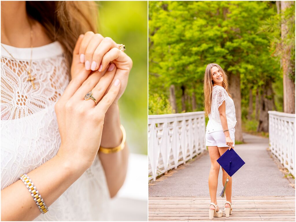 Charleston Southern University graduate smiling over her shoulder as she holds her cap during her senior photos