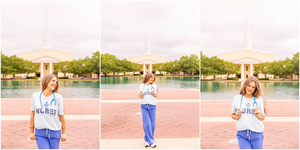 Charleston Southern University nursing graduate smiling beside the reflection pond with the chapel behind her