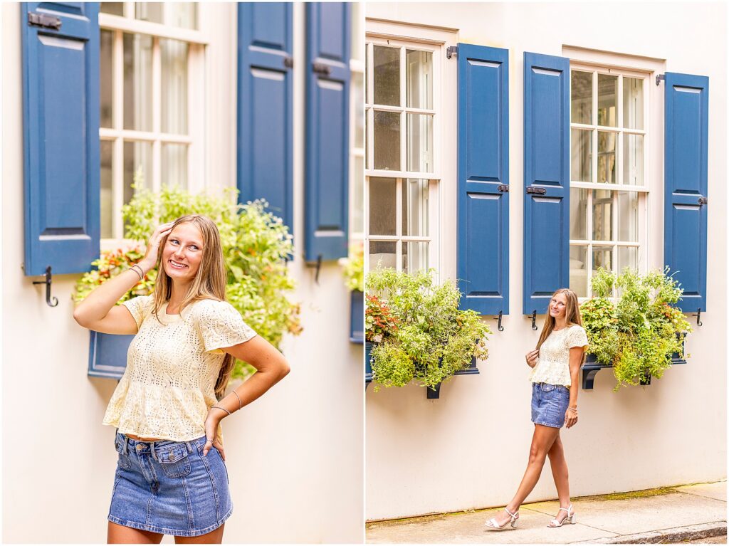 Joyful senior portrait on Rainbow Row highlighting Charleston's historic district and vibrant pastel homes