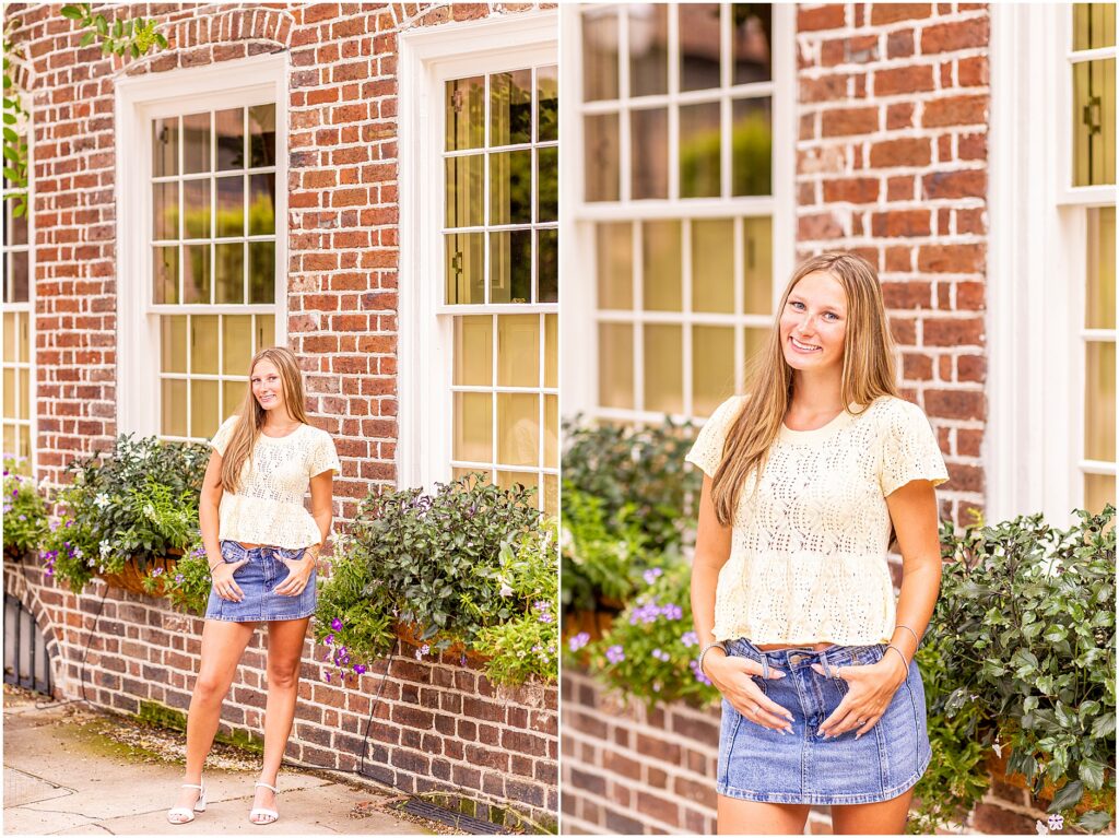 Natural senior portraits at Rainbow Row in downtown Charleston with historic homes and blooming window boxes