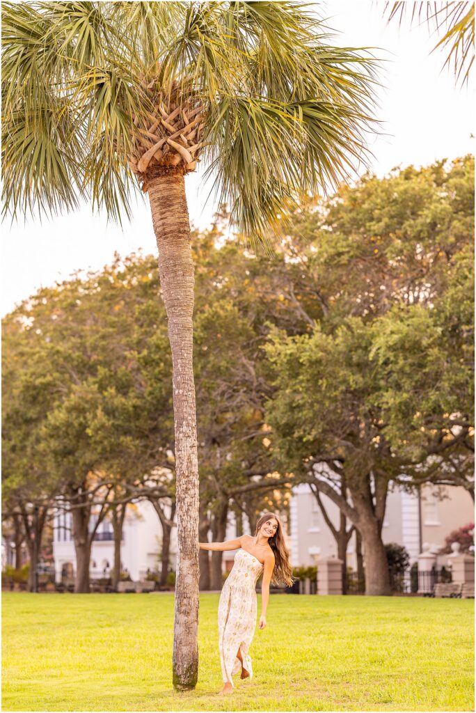 Charleston senior photographer capturing a natural portrait of a high school senior beside the water at Waterfront Park