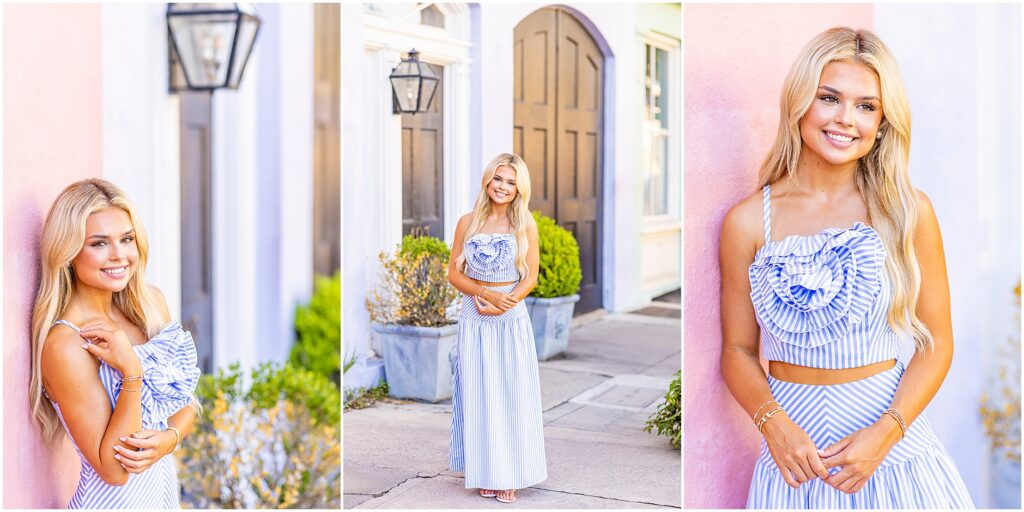 Senior girl in a blue and white striped dress walking along Rainbow Row during golden hour