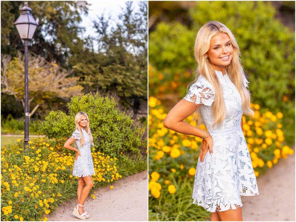 Senior girl in a light blue dress posing beneath Spanish moss at Hampton Park in Charleston