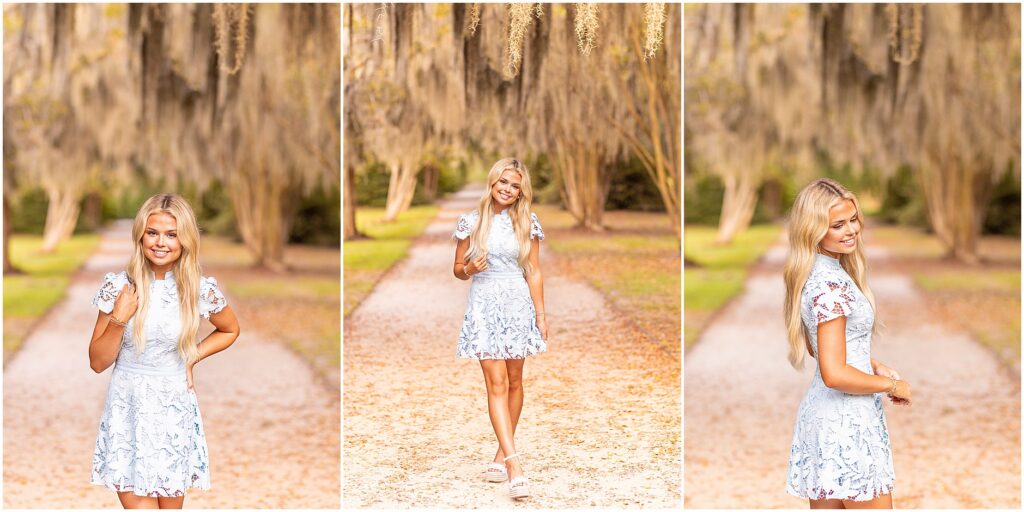 Senior girl walking beneath Spanish moss in a light blue dress during golden hour at Hampton Park