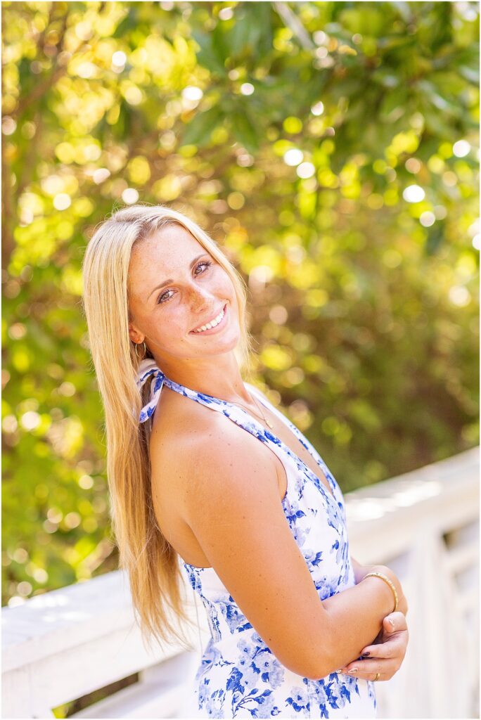 Senior portraits featuring warm sunlight filtering through the Lowcountry trees in Charleston