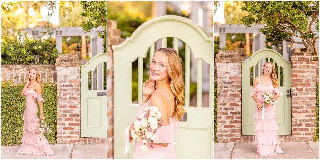 LoveShackFancy-inspired Charleston senior photos featuring a girl in a pink dress on Rainbow Row holding flowers